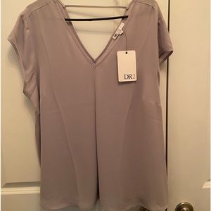 New with tags women’s light grey polyester XL dress shirt.